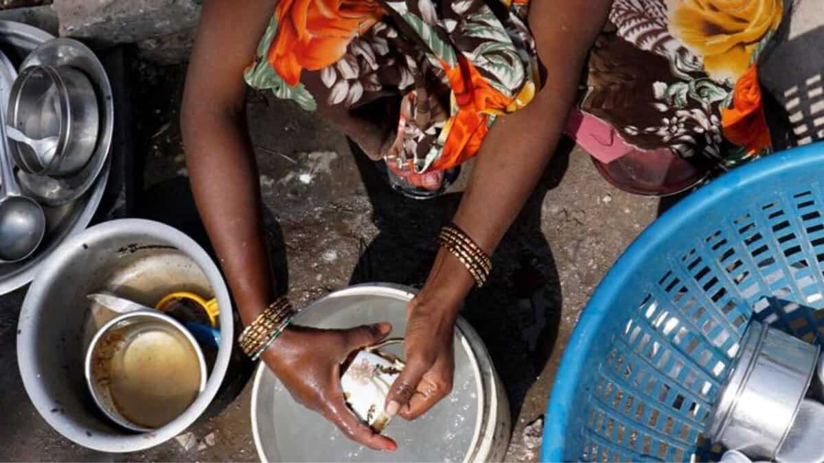 The image displays a picture of domestic worker in India