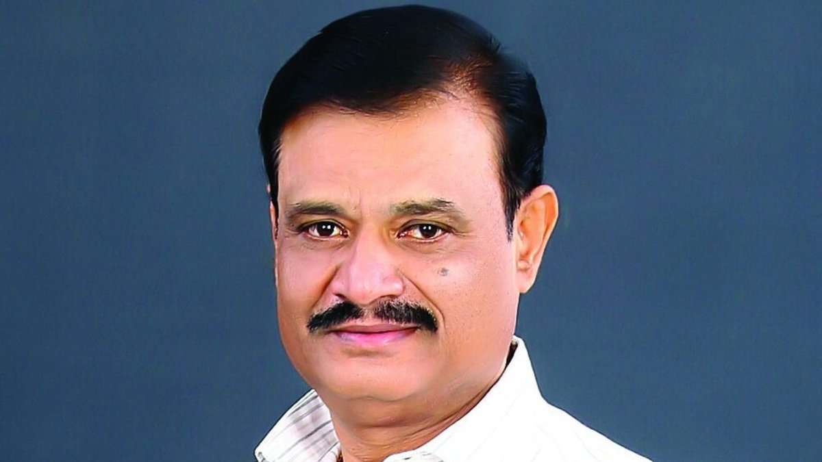 The image displays a picture of Karnataka BJP MLA Munirathna