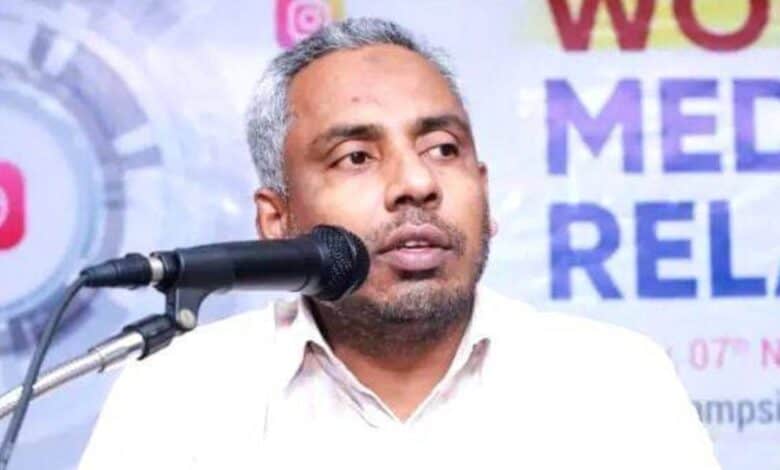 The image displays a picture of former general secretary of banned PFI- Abdul Sathar