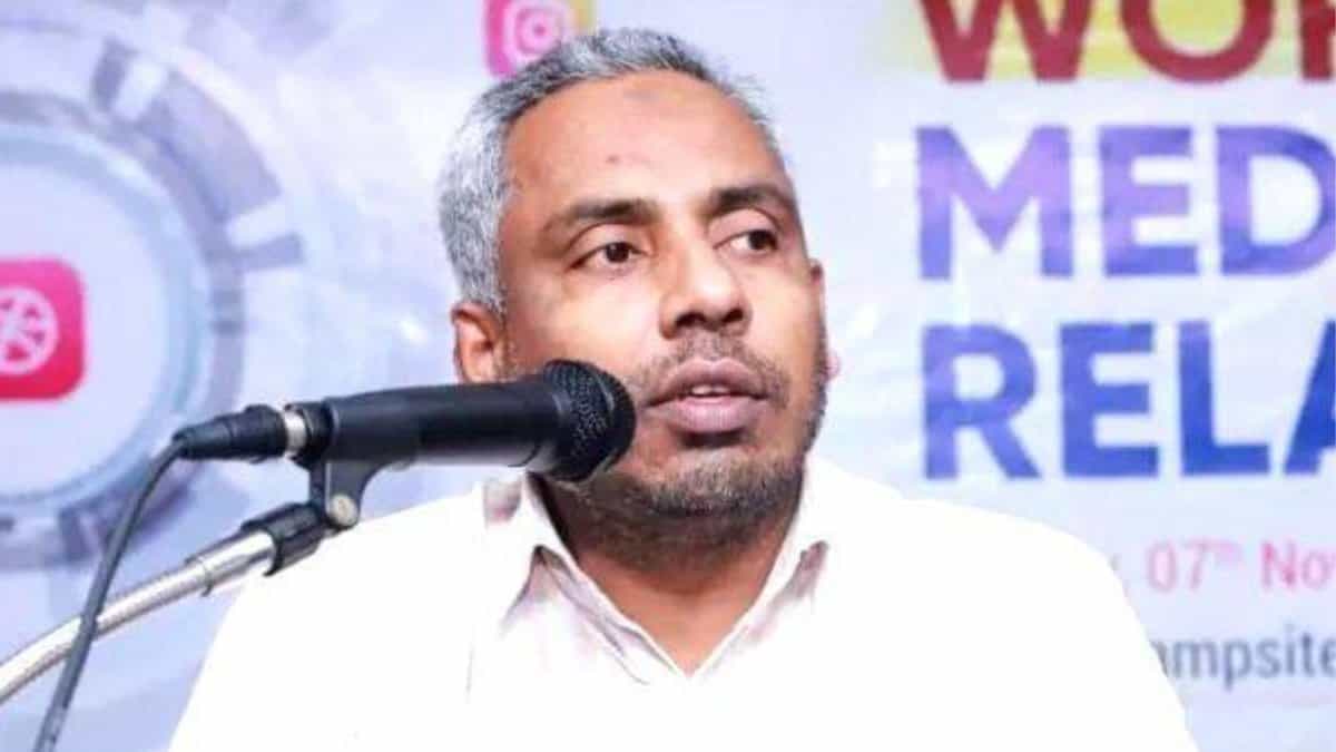 The image displays a picture of former general secretary of banned PFI- Abdul Sathar