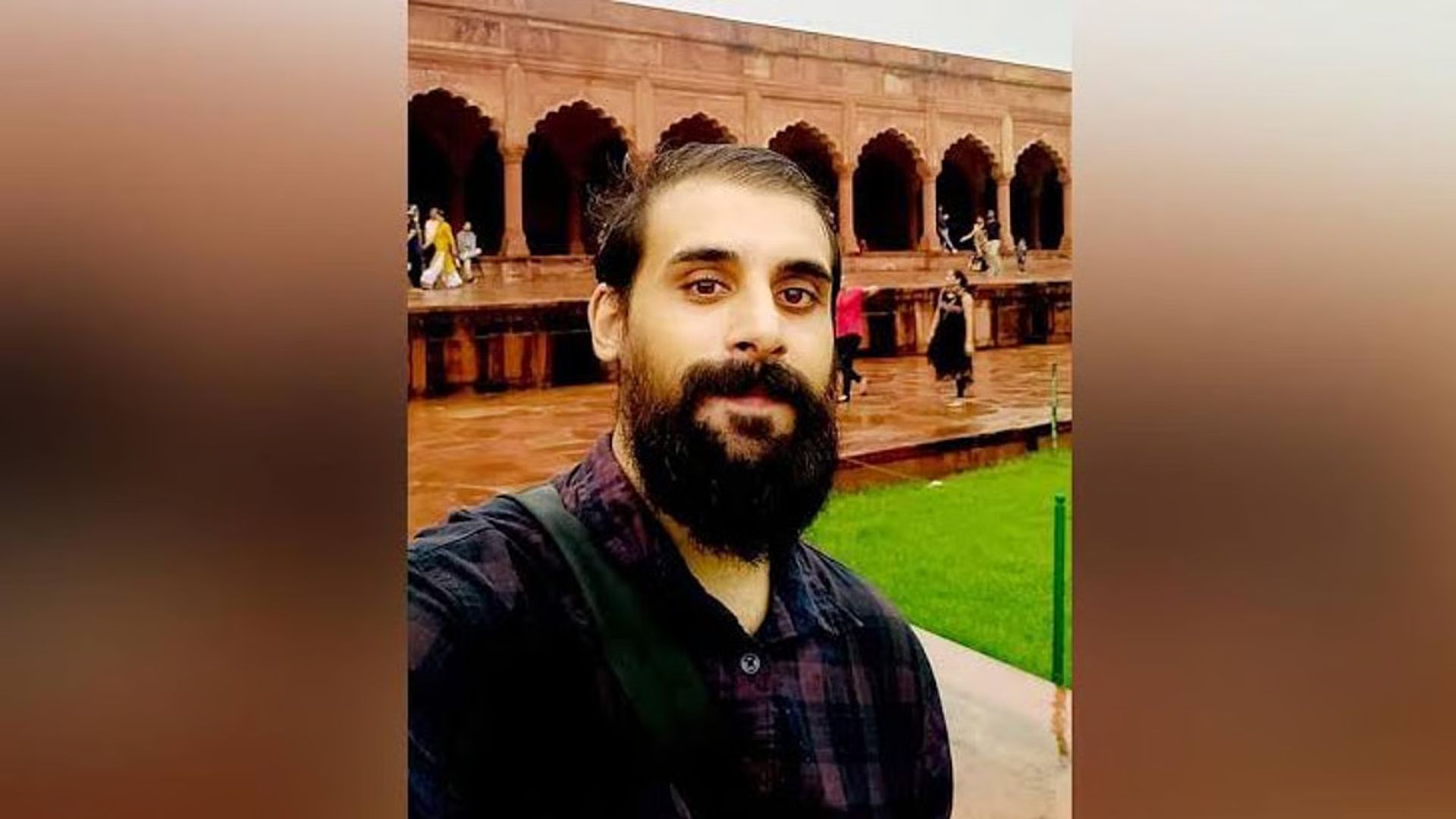 The image displays a picture of journalist Omar Rashid