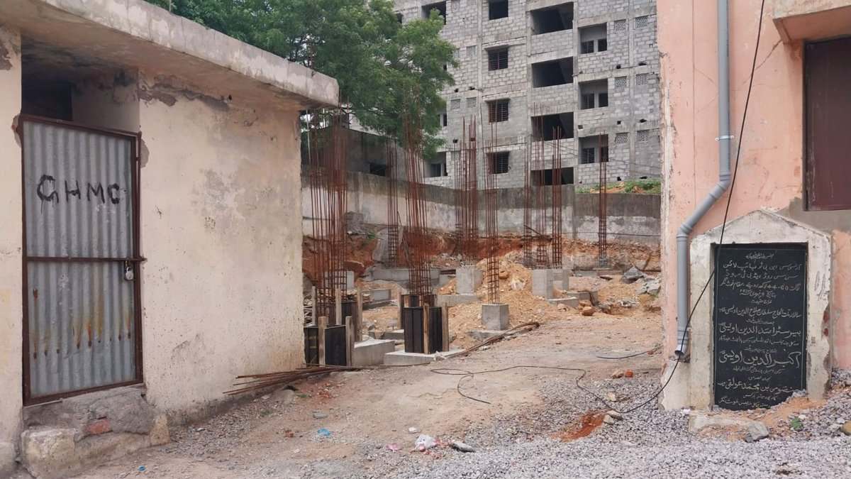 The image displays a picture of under constructed work of a new government junior college in Chandrayangutta