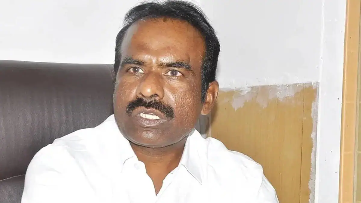 The image displays a picture of Karnataka BJP leader N Ravikumar