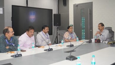 The image displays a picture of a meeting between officials of the IMD-Hyderabad and TGICCC at Banjara Hills on Thursday