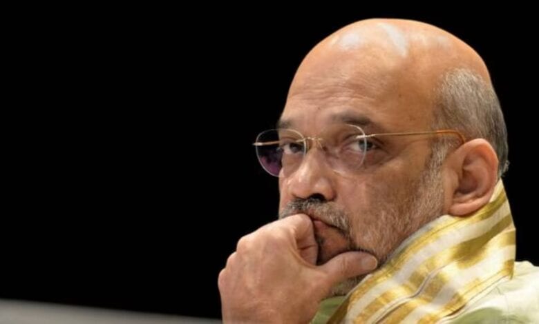 The image displays a picture of Union Home Minister Amit Shah