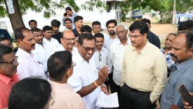 HYDRAA chief inspecting various locations across Hyderabad to resolve ongoing land disputes, accompanied by officials and local residents.
