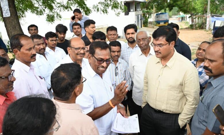 HYDRAA chief inspecting various locations across Hyderabad to resolve ongoing land disputes, accompanied by officials and local residents.
