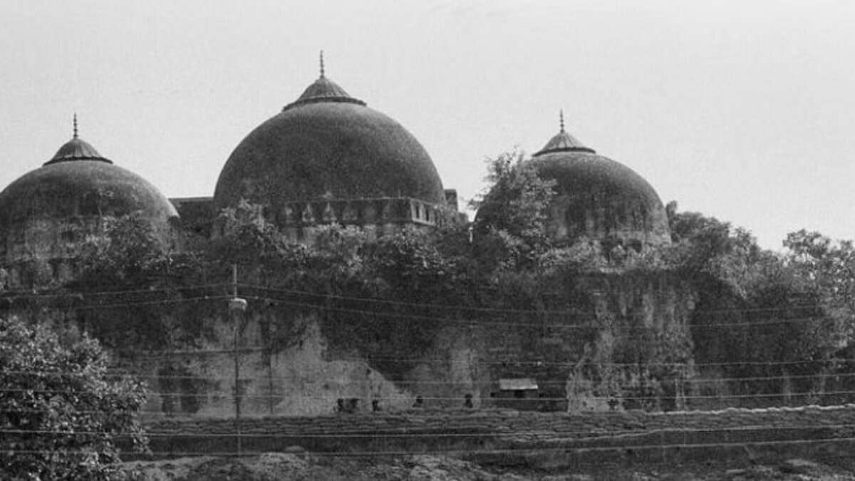 A 1990 file photo of the Babri Masjid in Ayodhya, showing the mosque’s main structure with its three domes. Image courtesy: PTI