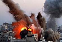 A massive explosion erupts in Gaza City as smoke and flames rise following an Israeli airstrike.