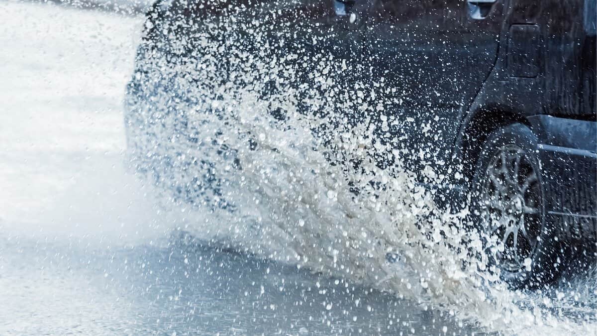 Representative image of a vehicle driving during rainfall
