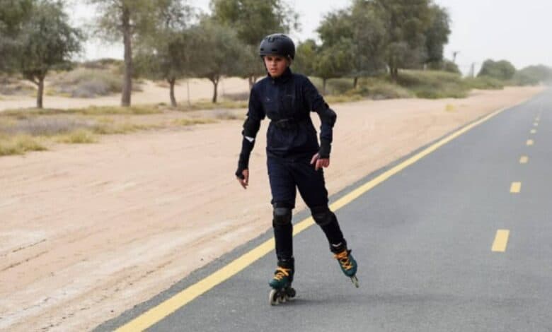 Zayne Merzi Sodawaterwala inline skating alone on a smooth track at Al Qudra, wearing full protective gear and a focused expression.