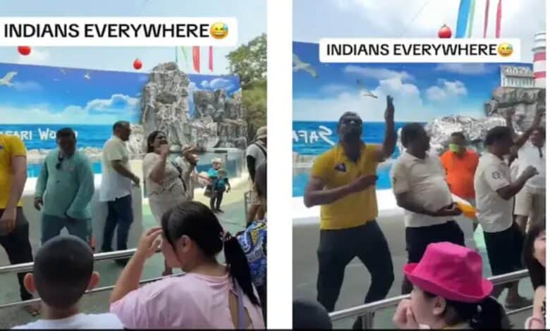 Indian tourists dancing at Zoo in Thailand