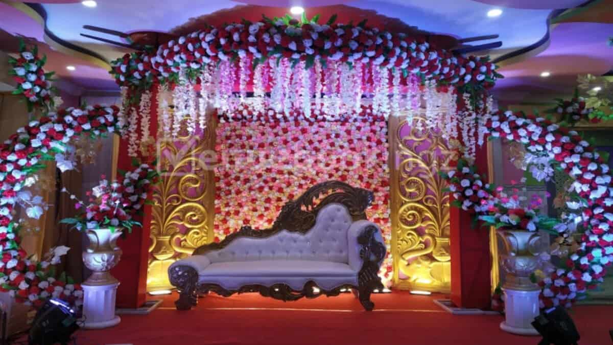 The image displays a picture of a marriage hall