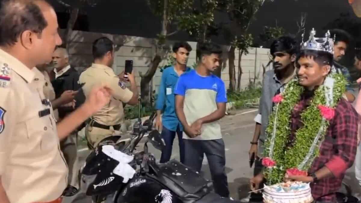 The image displays a picture of Uppal police officer taking class of a birthday boy wearing a crown