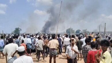 The image displays a picture of Telangana farmers protest against the construction of ethanol factory in Jogulamba Gadwal district