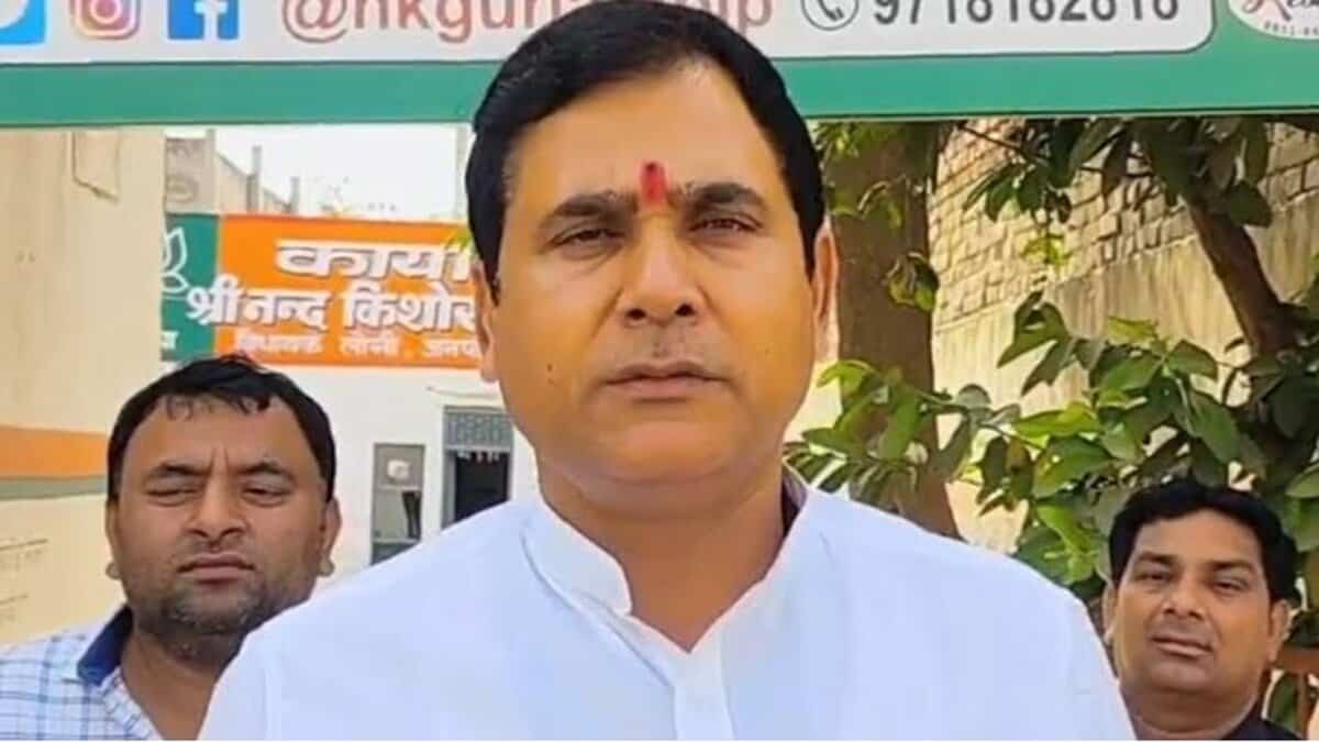 The image displays a picture of BJP Loni MLA Nand Kishor Gurjar