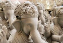The image displays a picture of eco friendly Ganesh idols