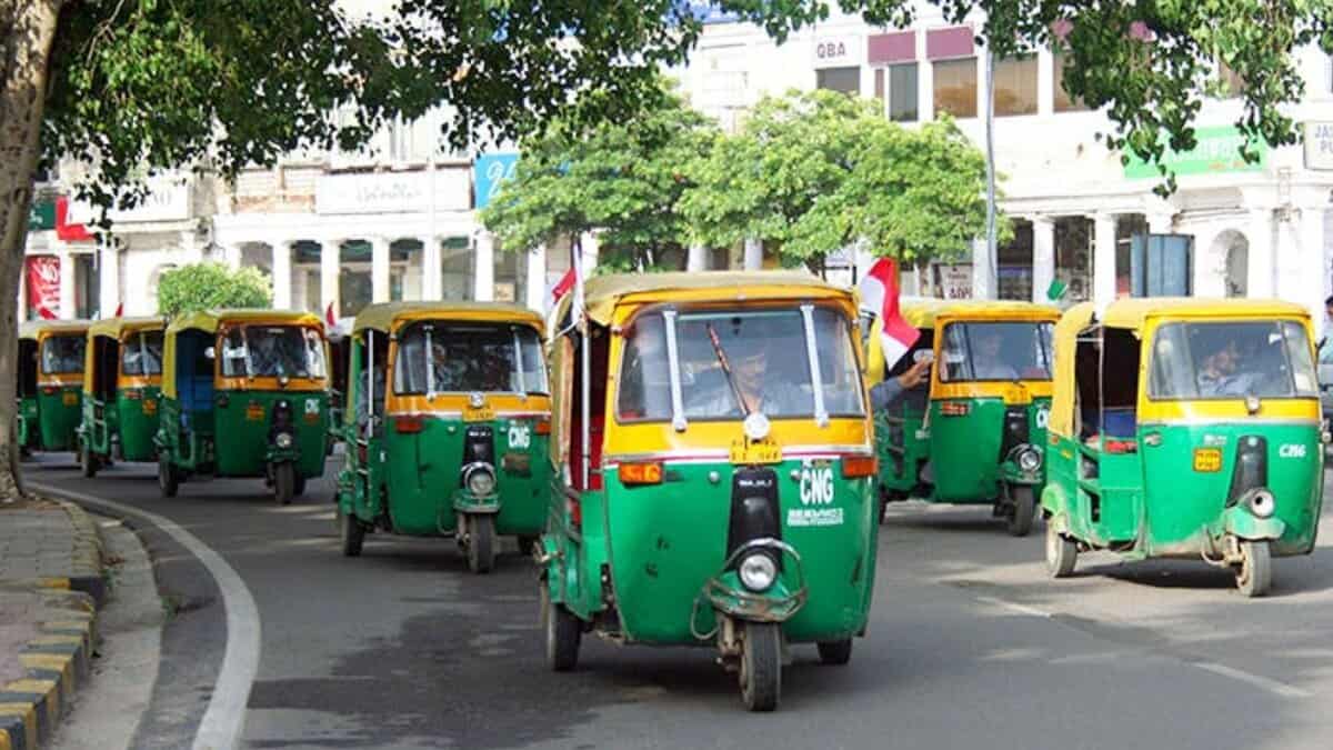 The image displays a picture of eco friendly autos in Hyderabad