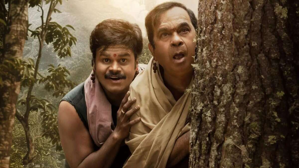 The image displays a poster of Vishnu Manchu's new film, Kannapa. The poster features comedian Saptagiri and another that introduces comic character, ‘Pilaka Gilaka’, played by veteran actor Brahmanandam.