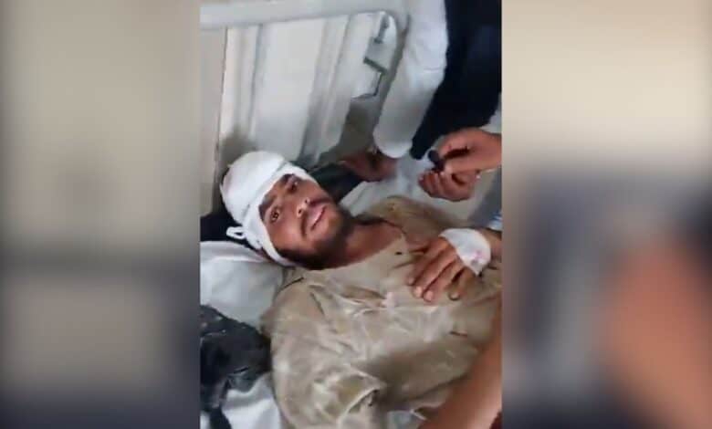 The image displays a picture of an injured Muslim man whose family was attacked in Nizamabad by right-wing affiliated organisation