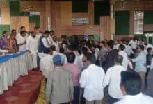 The image displays a picture of Congress workers clash at Khairtabad