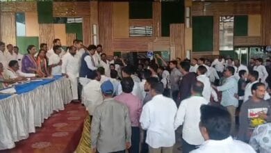 The image displays a picture of Congress workers clash at Khairtabad