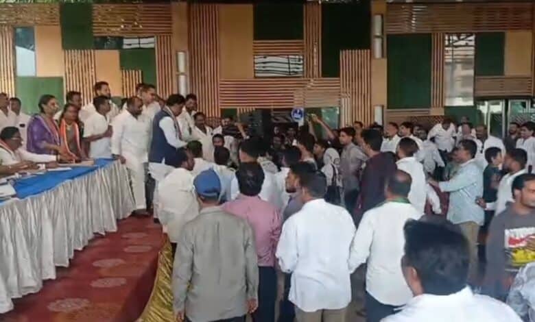 The image displays a picture of Congress workers clash at Khairtabad