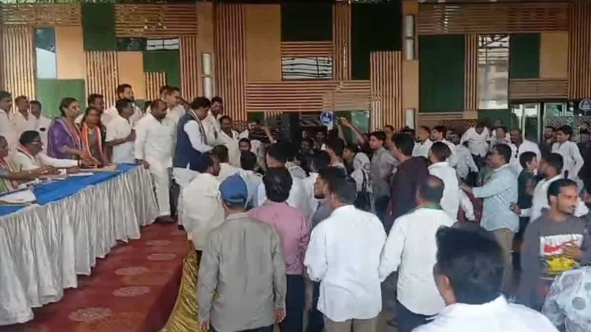 The image displays a picture of Congress workers clash at Khairtabad