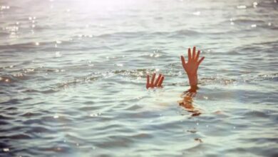 A representational image depicting a drowning person