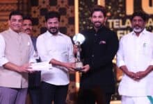 Allu Arjun receiving the Best Actor award from Telangana CM and deputy CM