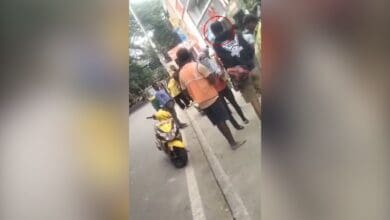 A Rapido driver and a woman passenger arguing in Bengaluru