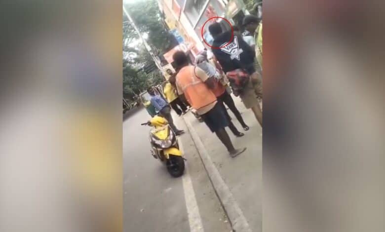 A Rapido driver and a woman passenger arguing in Bengaluru