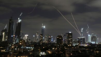 The Israeli Iron Dome air defense system fires to intercept missiles over Tel Aviv on Sunday. (AP/PTI)