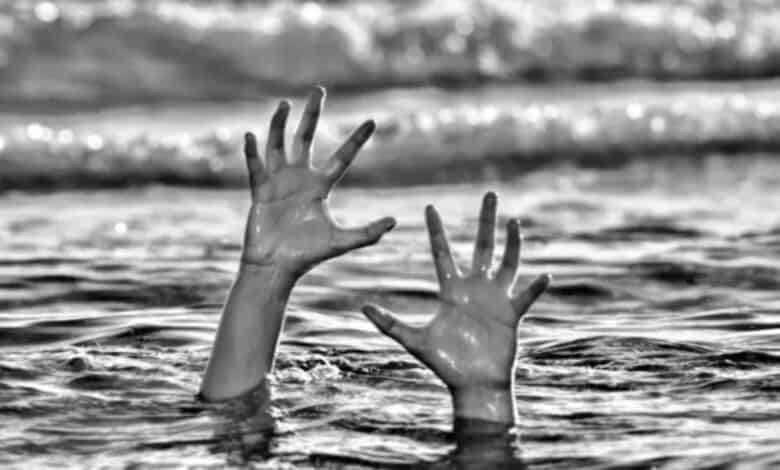 An image of a person drowning. used for representational purpose