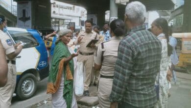 A homeless woman being relocated in Hyderabad