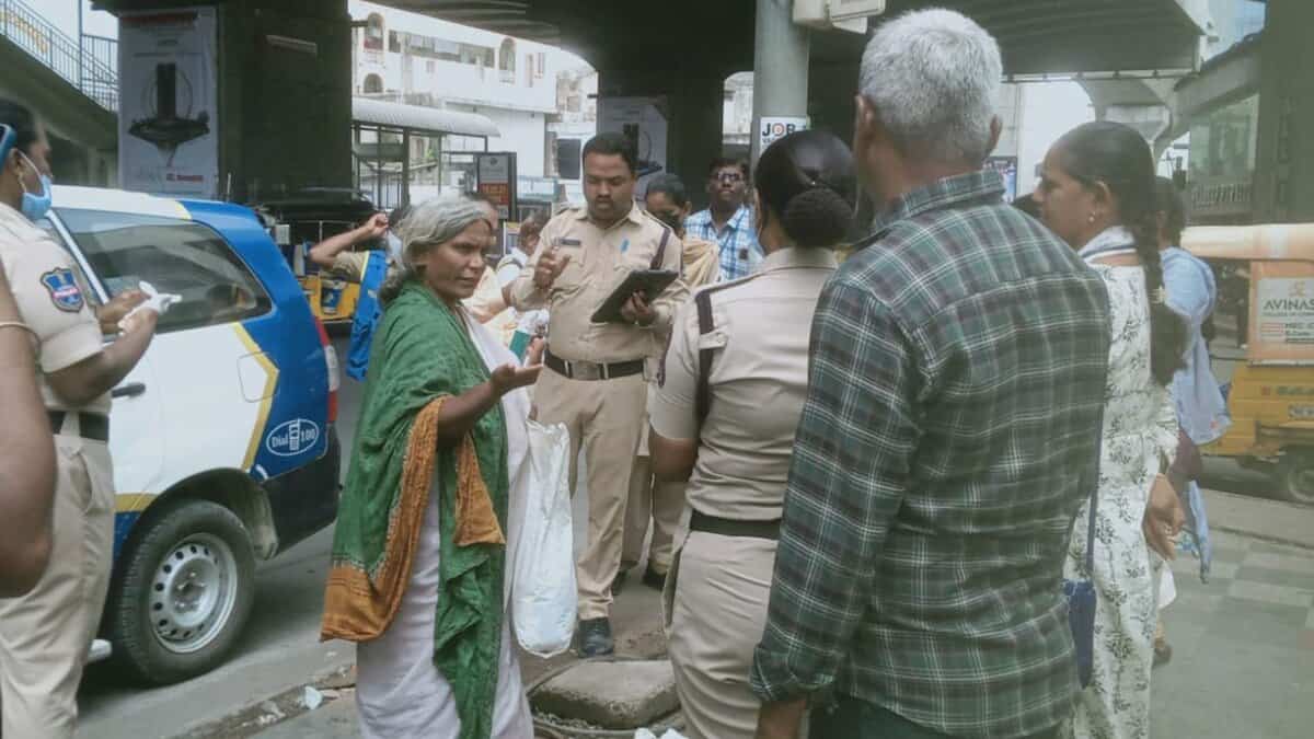 A homeless woman being relocated in Hyderabad