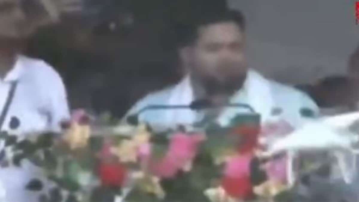 RJD leader Tejashwi Yadav ducks on stage