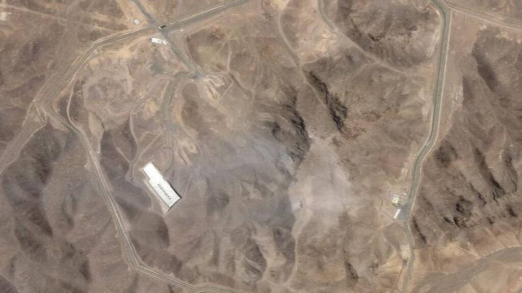 Satellite image of Iran’s Fordow nuclear enrichment facility, showing mountainous terrain with visible access roads and structures, following a reported US air strike on June 22, 2025.
