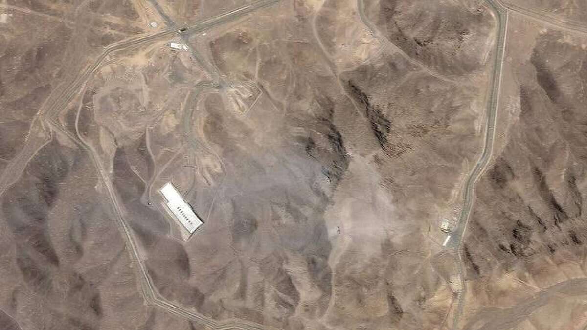Satellite image of Iran’s Fordow nuclear enrichment facility, showing mountainous terrain with visible access roads and structures, following a reported US air strike on June 22, 2025.