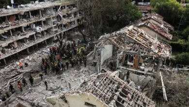 Emergency crews at the site of buildings destroyed by Iranian missile strikes in Tel Aviv. Several rockets hit residential areas, causing widespread damage.