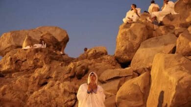 Haj pilgrims pray and reflect on the rocky slopes of Mount Arafat during the Day of Arafat, the spiritual peak of the Haj pilgrimage in Makkah, Saudi Arabia.