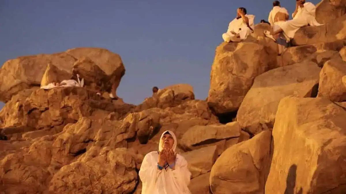 Haj pilgrims pray and reflect on the rocky slopes of Mount Arafat during the Day of Arafat, the spiritual peak of the Haj pilgrimage in Makkah, Saudi Arabia.