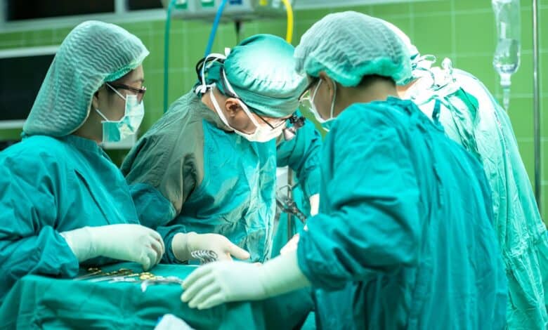 Representational photo of doctors performing surgery.