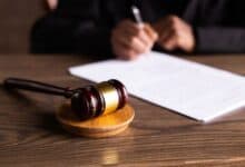 represental image showing gavel and papers for court case ruling