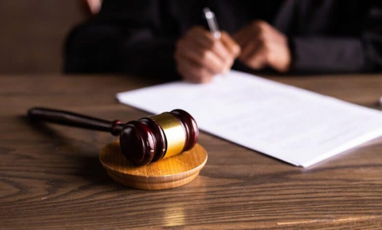 represental image showing gavel and papers for court case ruling