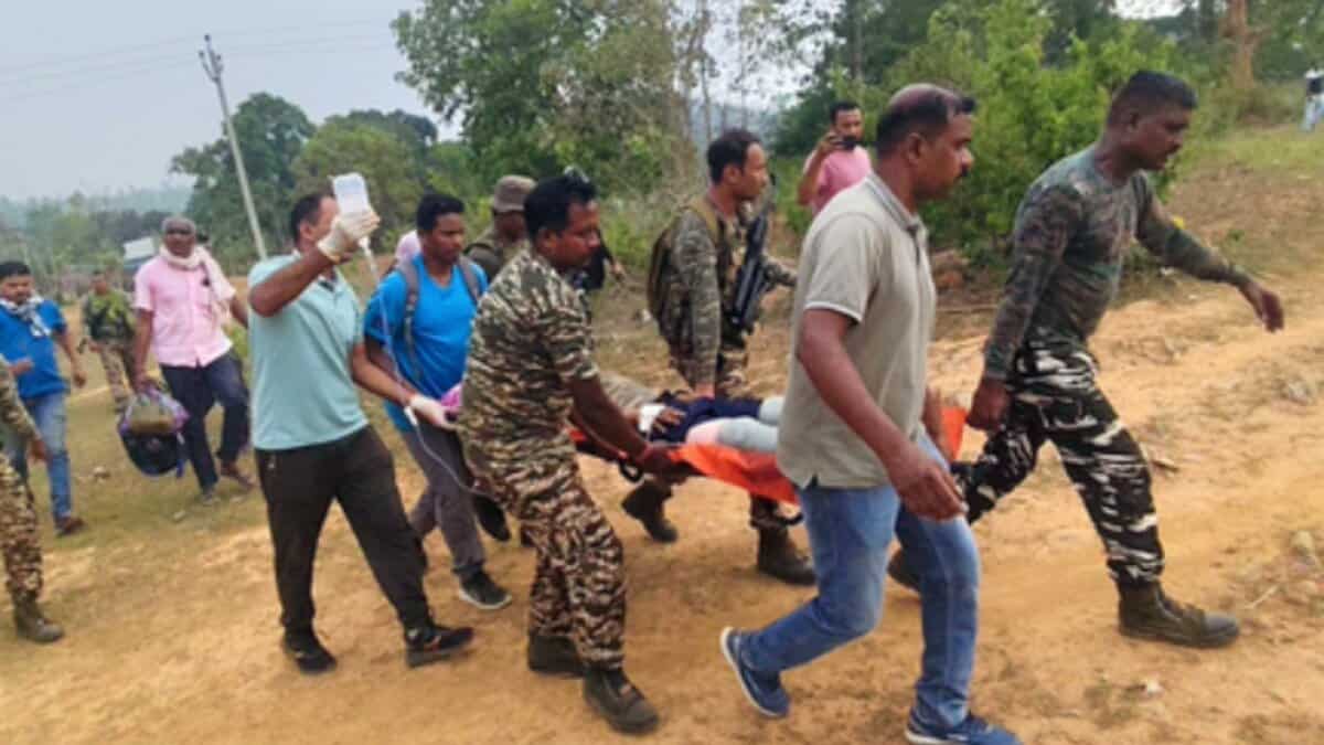 Image shows Central Reserve Police Force (CRPF) personnel and other officials carrying injured ASI Satwan Singh after he was wounded in an IED blast during an anti-Naxal operation in Odisha.