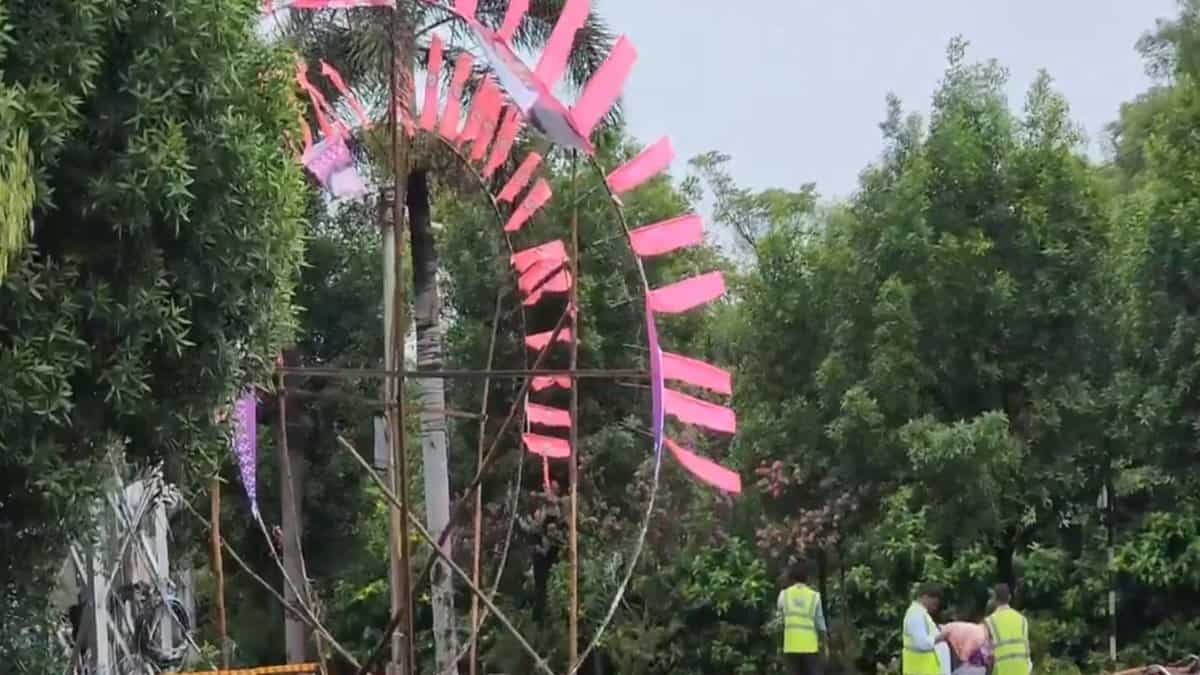 GHMC workers remove posters of KTR in Hyderabad