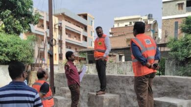 GHMC commissioner inspects SNDP drain at Padma Colony