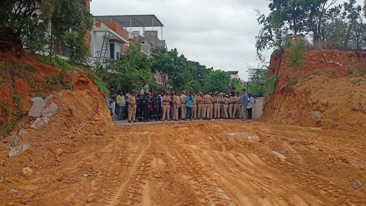 The image shows the demolished compound wall built by a realtor in Nizampet municipality of Dundigal mandal in Medchal-Malkajgiri district.