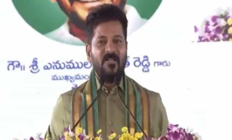 Revanth Reddy addresses a gathering during Vana Mahotsavam programme